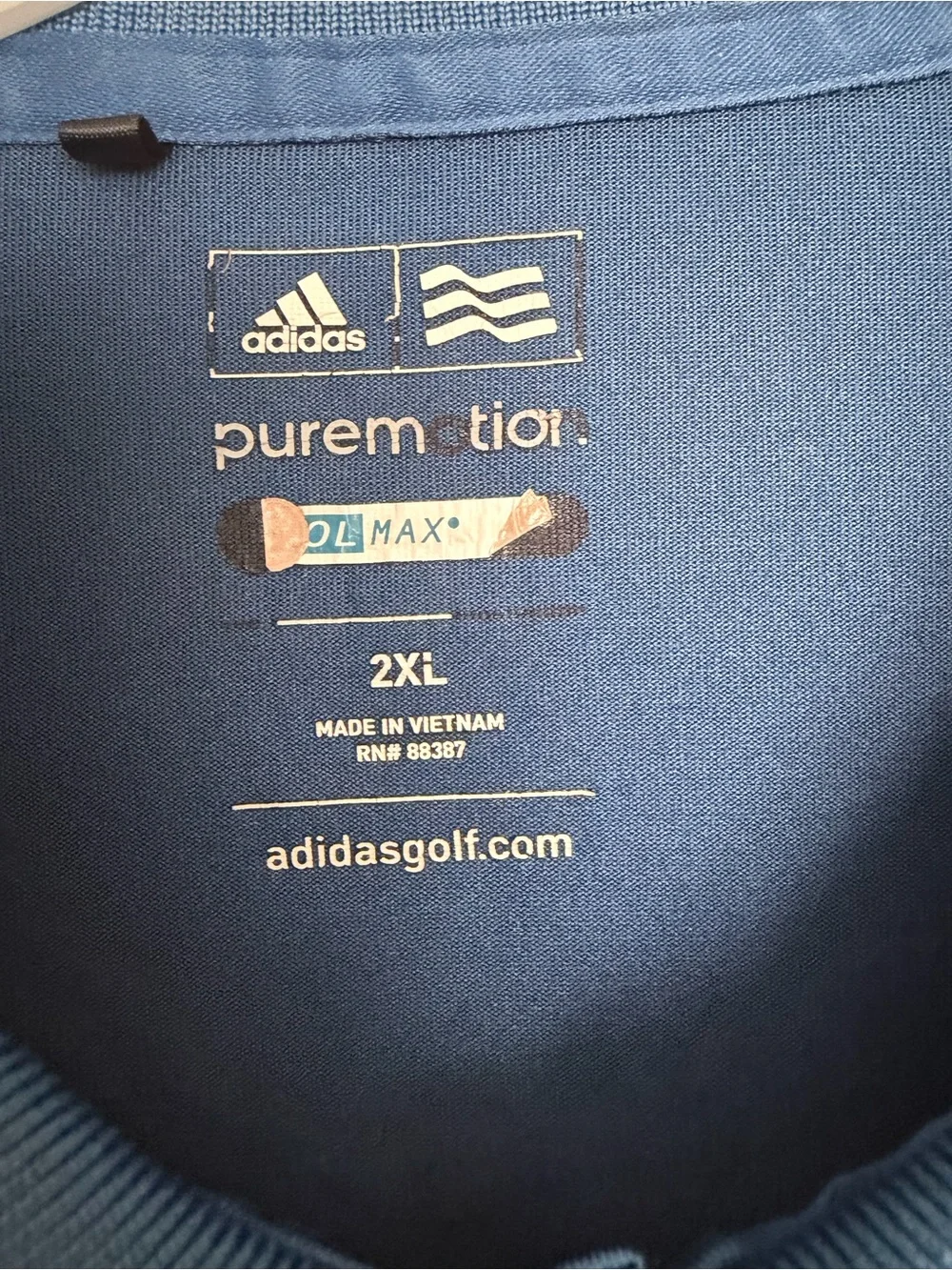 adidas Blue Polo Shirt with Red Sleeve Stripes